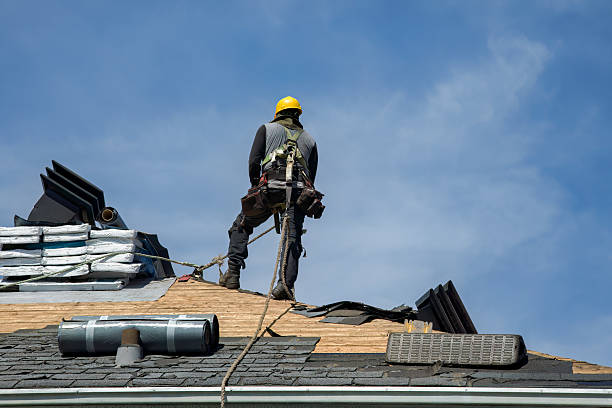 Professional Roofing technician working in Mendon, MA